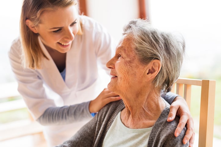 Healthcare staff personal taking care a resident