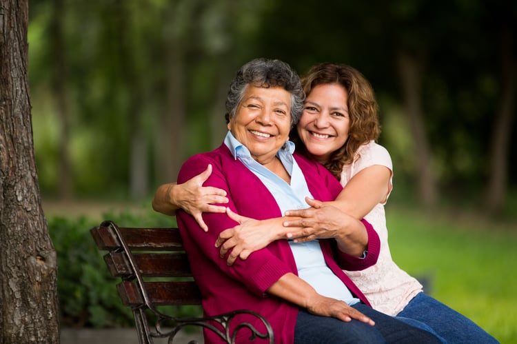 Senior parent with dementia and daughter enjoying a relaxing day trip in temecula