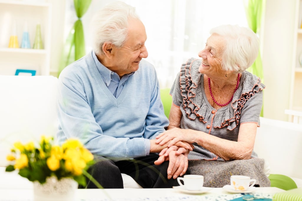 older couple discussing Couples Care at Highgate Senior Living