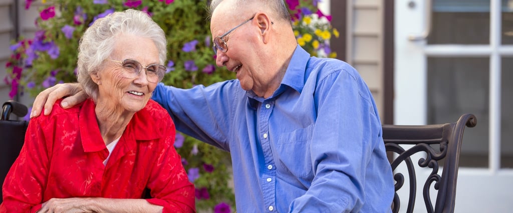 an elderly couple talking about temecula assisted living community Highgate Senior Living