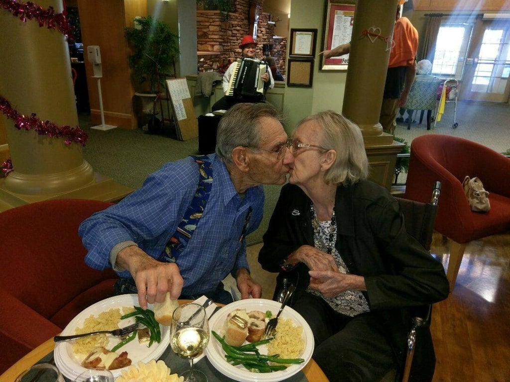Assisted living facility with memory care couple enjoying valentine's dinner
