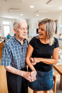 family caregiver helping dad who has dementia 