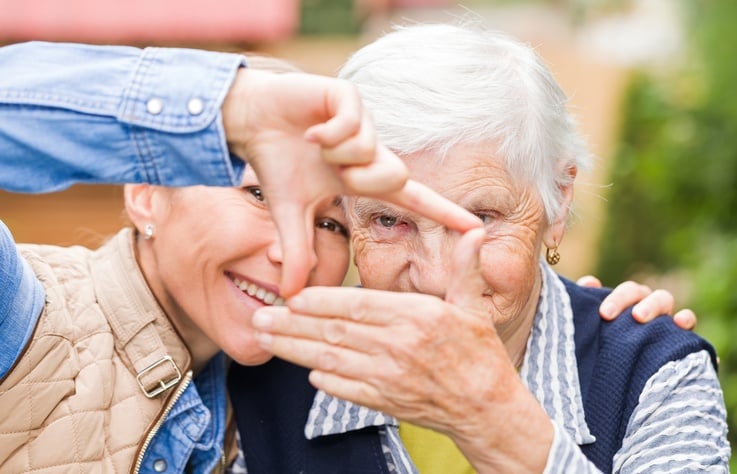 mom and daughter together discussing what is memory care